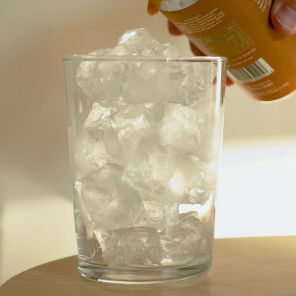 Ice cubes stored in plastic cups for cheap iced coffee. You just add the  coffee near the exit after you have paid.